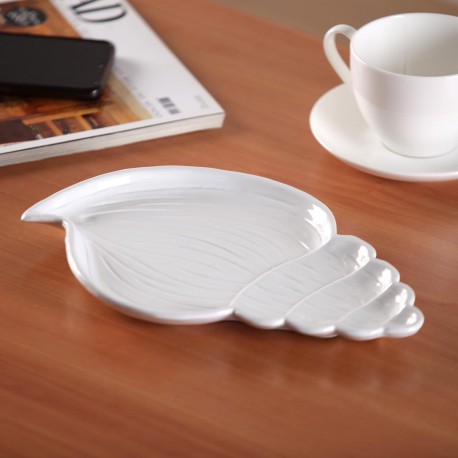 WHITE CERAMIC SHELL FIGURE